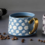 TT BLUE FLWR TEA MUG