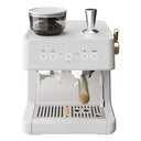 White espresso machine with a clear container on top, featuring various control knobs and a steam wand.