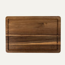 Wooden cutting board on a white background