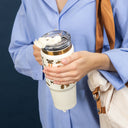 Thyme & Table 32 fl oz Stainless Steel Luna Tumbler with Handle and Dual Straw Lid, Cream & Gold Bows